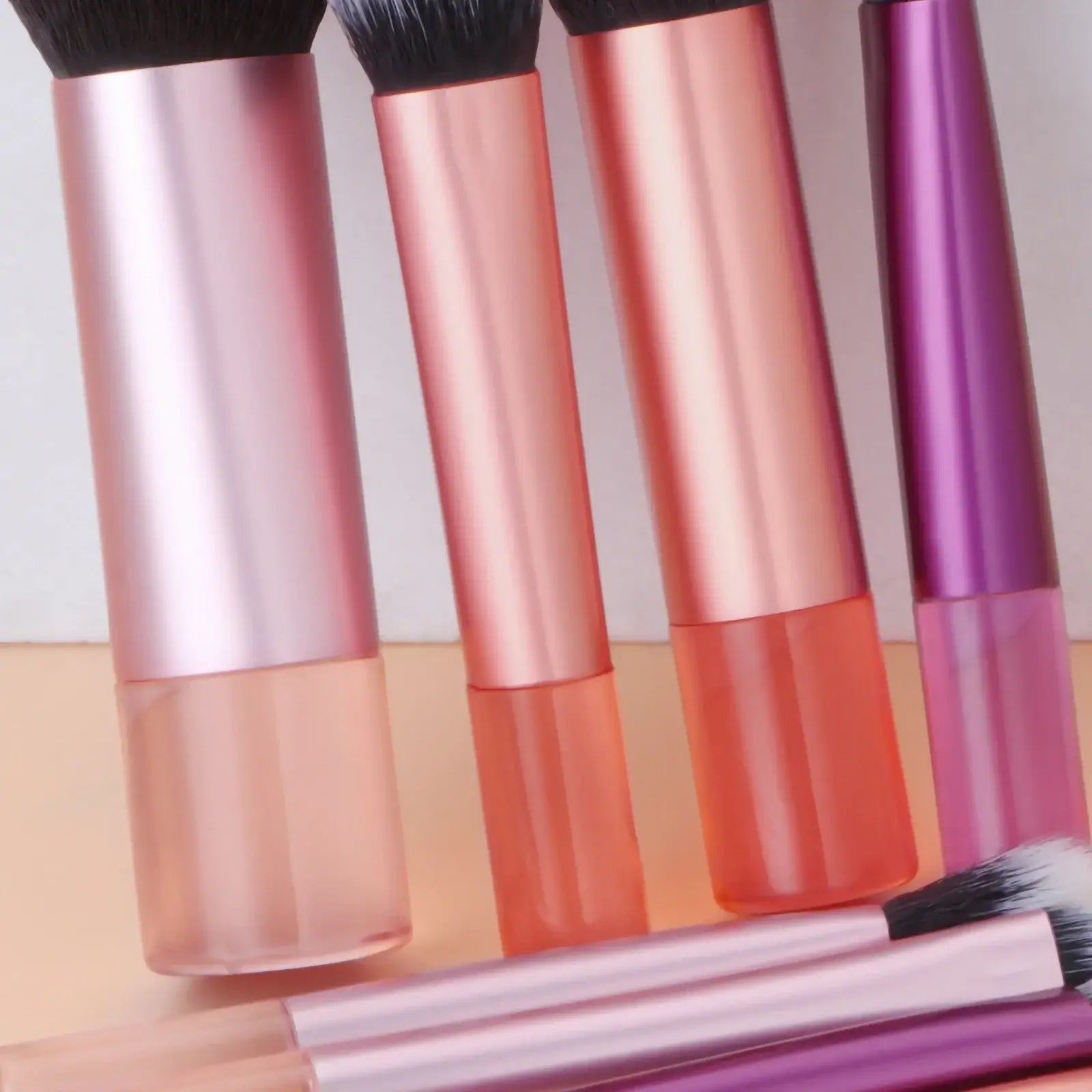 Set of 10 pink mini portable makeup brushes with puff, professional palm brushes for travel and makeup application by amzzonstore.