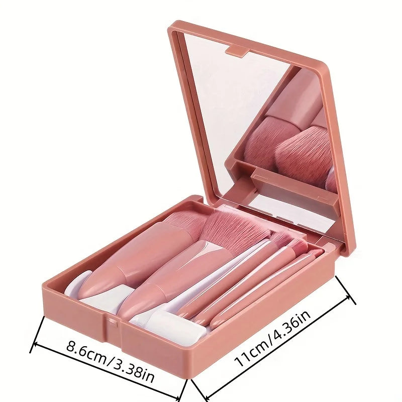 Portable mini makeup brush set with foldable design and mirror, ideal for travel, includes five brushes for cosmetics application.