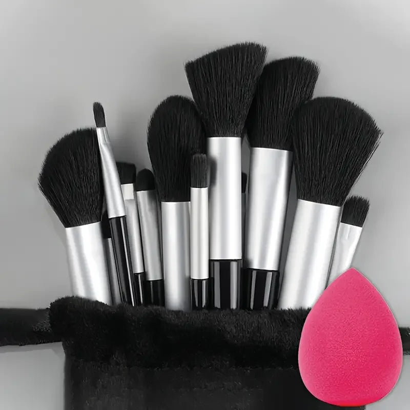 Set of 13 professional makeup brushes by amzzonstore, including foundation, eyeshadow, blush, and blending brushes with soft fluffy bristles.