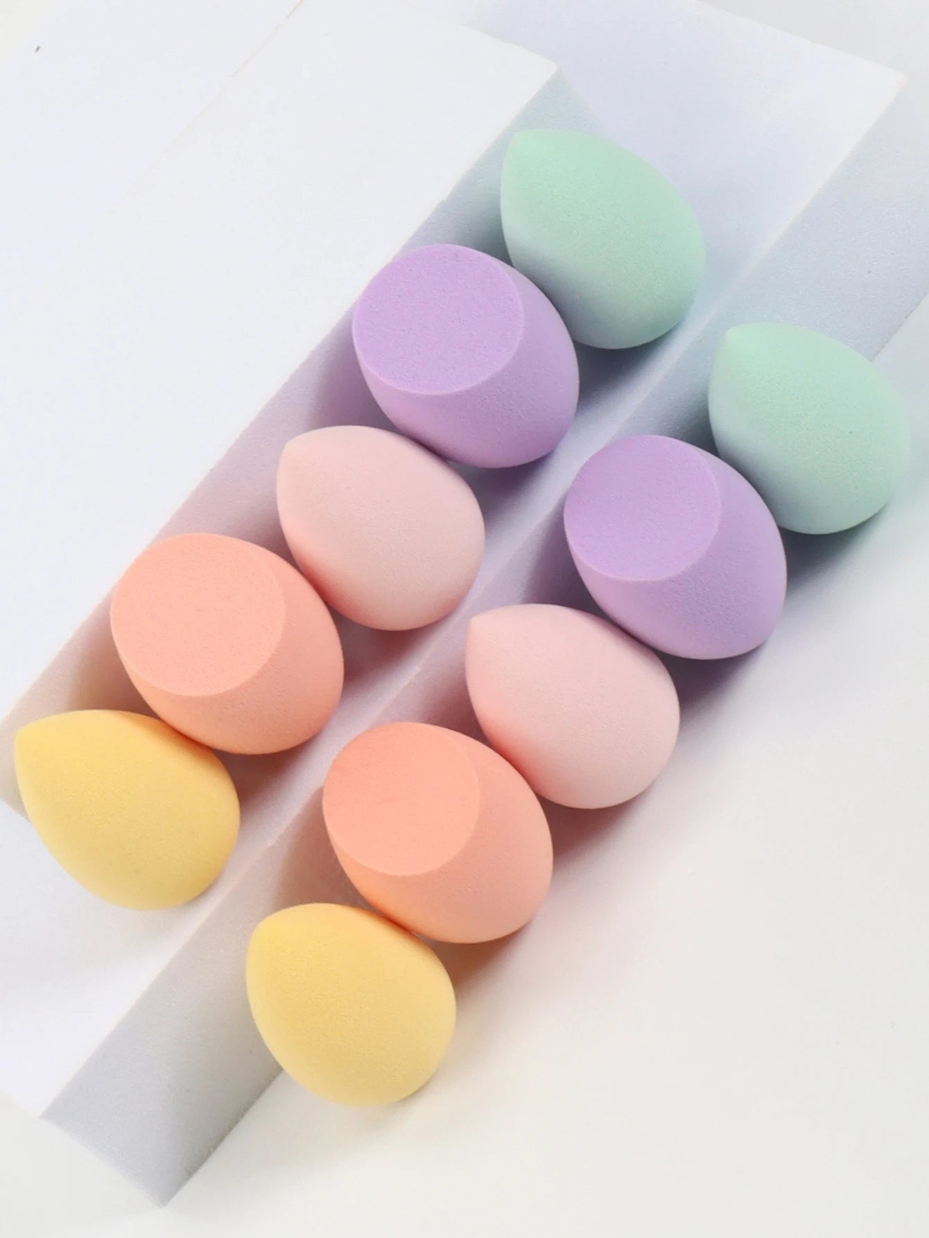 Set of 10 mini makeup sponge powder puffs for concealer, foundation, and face makeup by amzzonstore, soft and versatile cosmetic applicators.