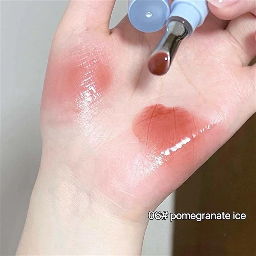Amzzonstore Metal Head Ice Diamond Essence Lip Tint in water light glass bottle, moisturizing and plumping lips with glossy finish