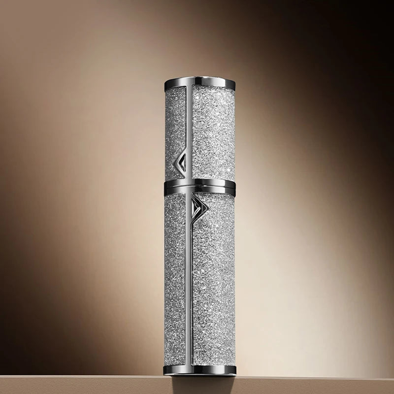 Refillable 5ML leather travel perfume atomizer with spray nozzle, compact portable design for on-the-go fragrance application.