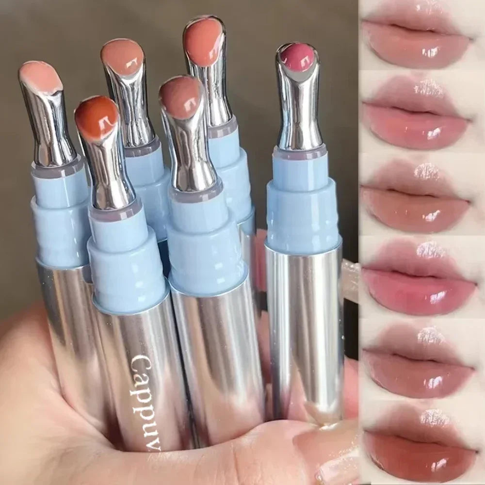 Amzzonstore metal head ice diamond essence lip tint in a water light glass container, moisturizing and plumping lips with a glossy finish.