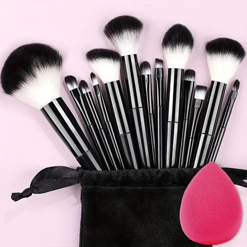 Set of 13 professional makeup brushes including foundation, eyeshadow, blush, and powder brushes with soft, fluffy bristles.