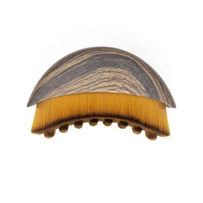 Wooden facial lymphatic drainage brush for sculpting and anti-puffiness massage, designed for skin care and facial cleansing.