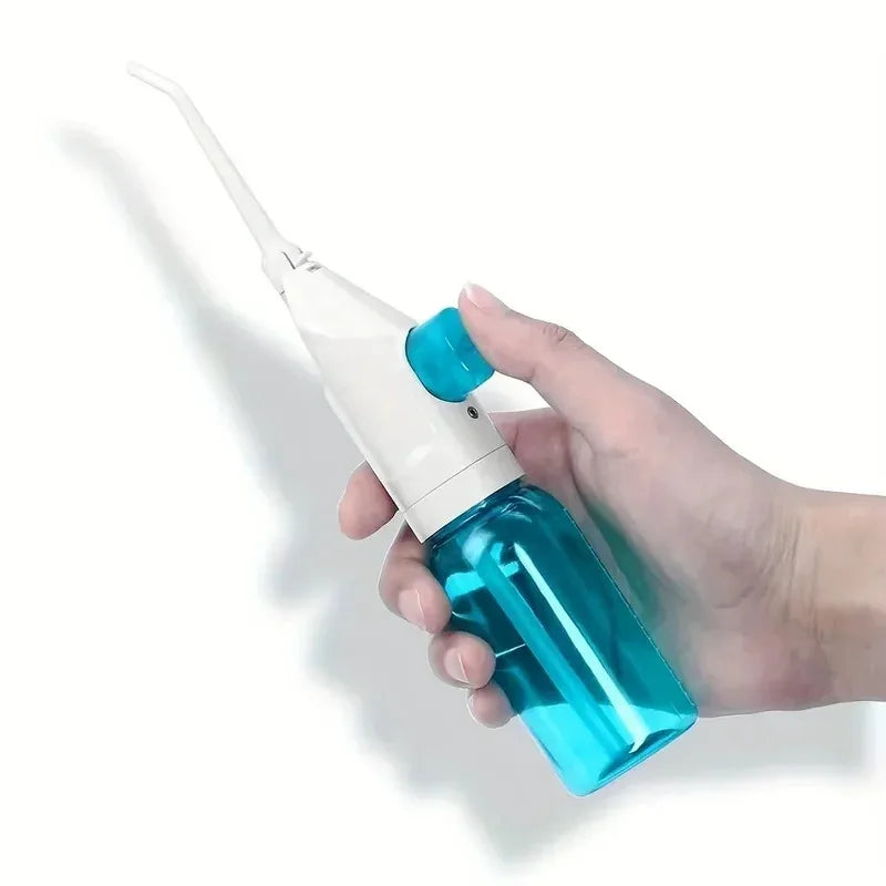 Portable manual water flosser by amzzon.store, high-pressure oral irrigator with toothpick-style interdental cleaner in compact design.