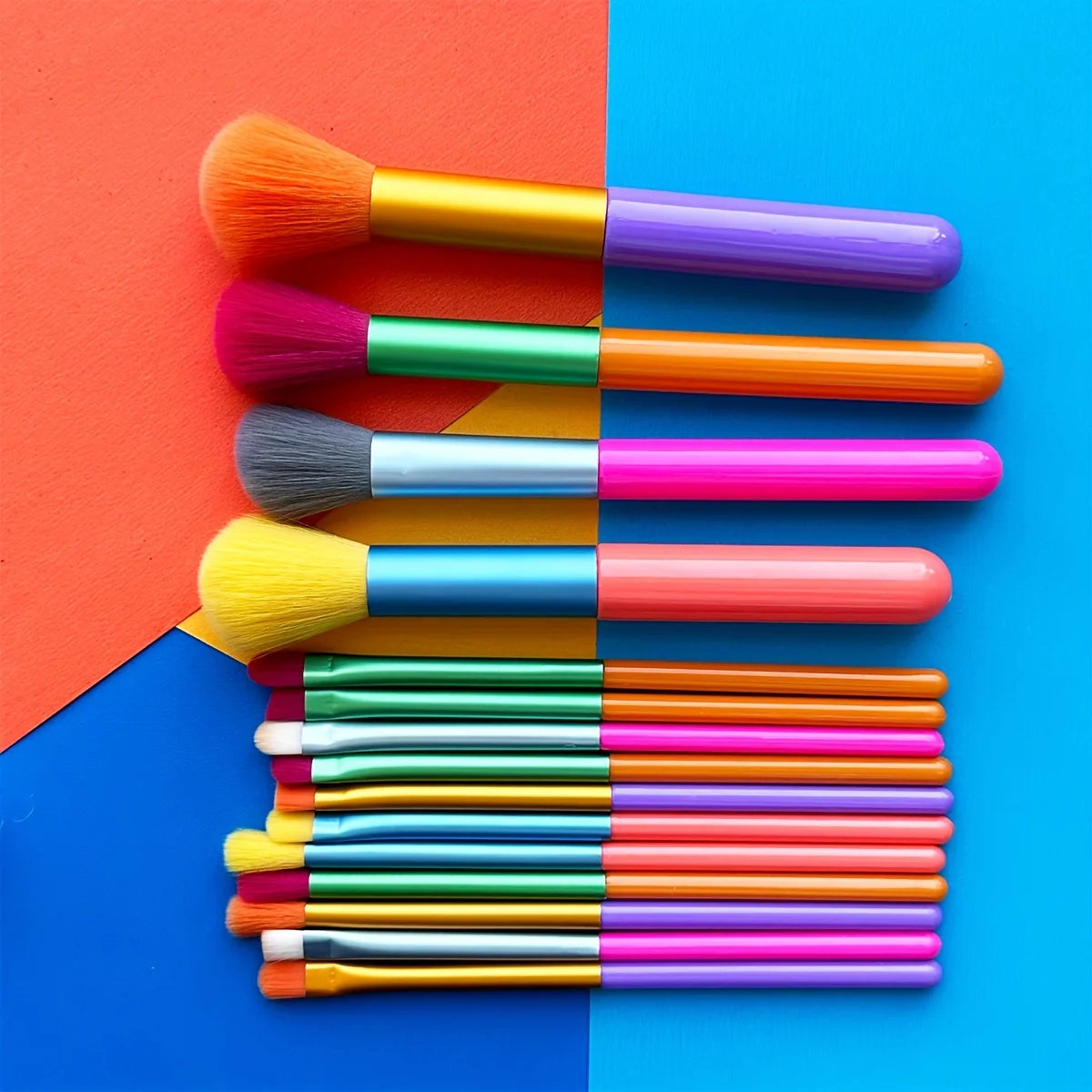 Colorful 15-piece makeup brush set by amzzonstore, includes foundation, contour, blush, concealer, and eye shadow blending brushes.