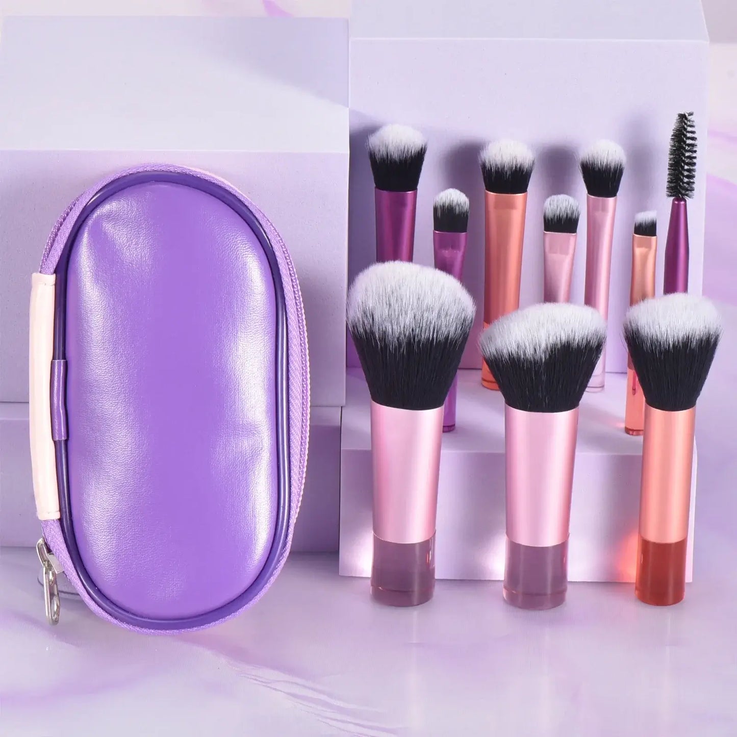 Set of 10 pink mini travel makeup brushes and puffs from amzzonstore, compact professional makeup tools for on-the-go application.