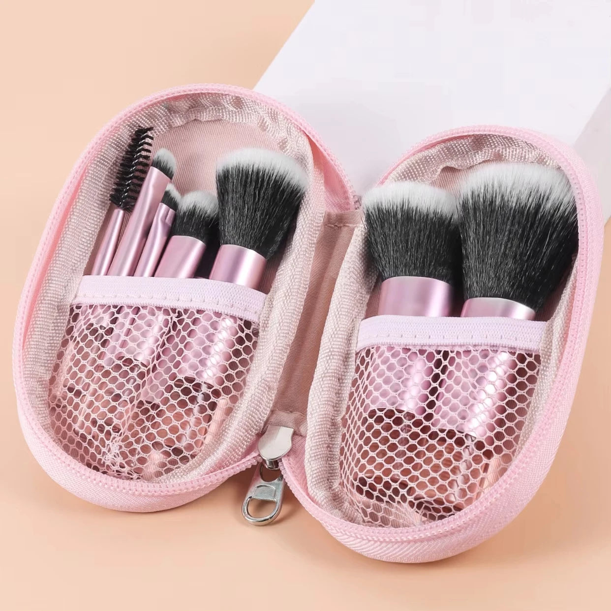 10-piece mini makeup brush set by amzzon.store, includes face and eye brushes with portable pouch for travel and precise application.