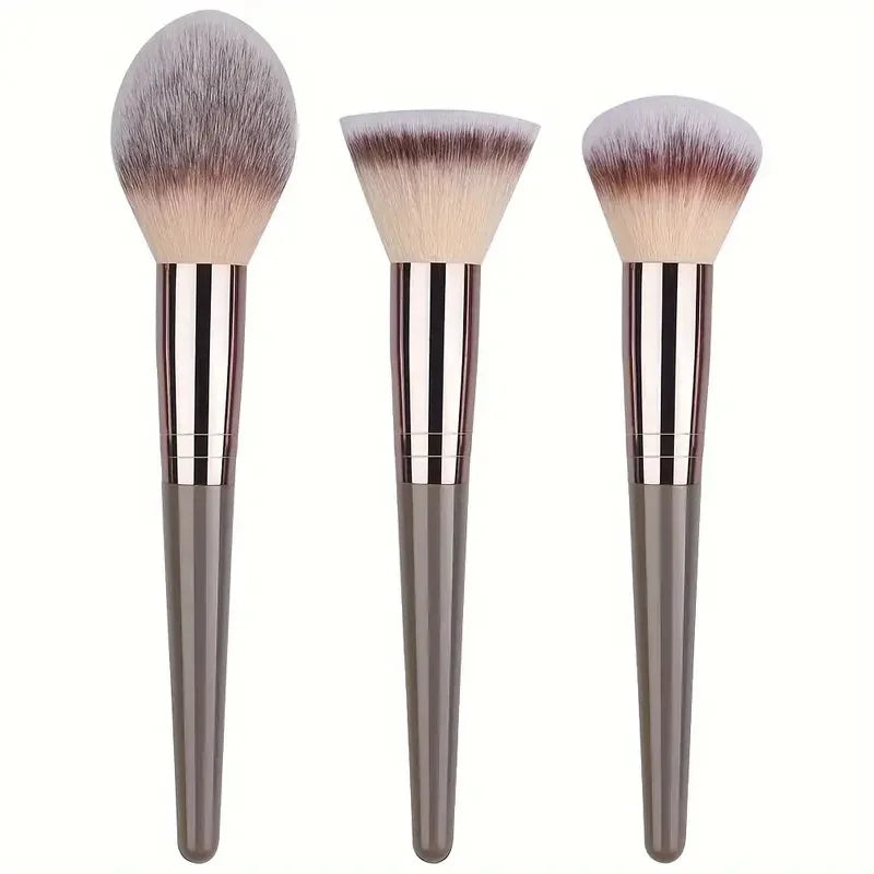 Set of professional makeup brushes from amzzonstore, including foundation, eyeshadow, concealer, blush, and kabuki brushes in soft, fluffy bristles.